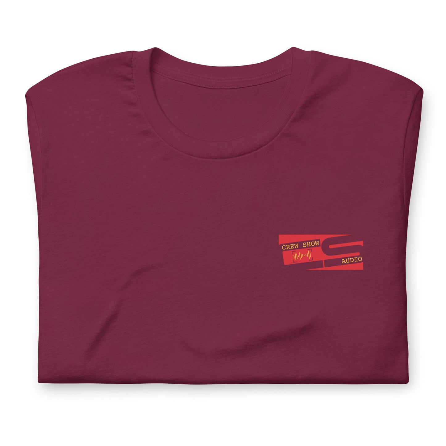 Raise the flag Sound crew graphic T-shirt. Front view folded maroon t-shirt with a graphic in red that looks like a flag.