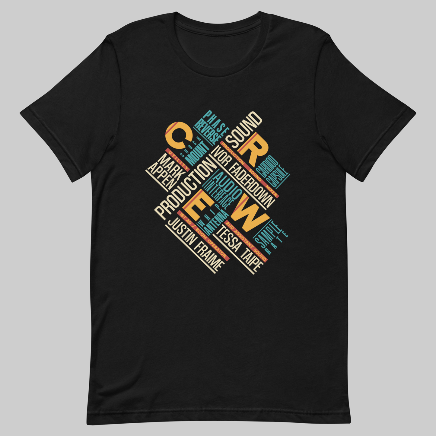 Credits Film Sound Crew graphic t-shirt. Front view of an open black t-shirt with a colourful typographic design on it.