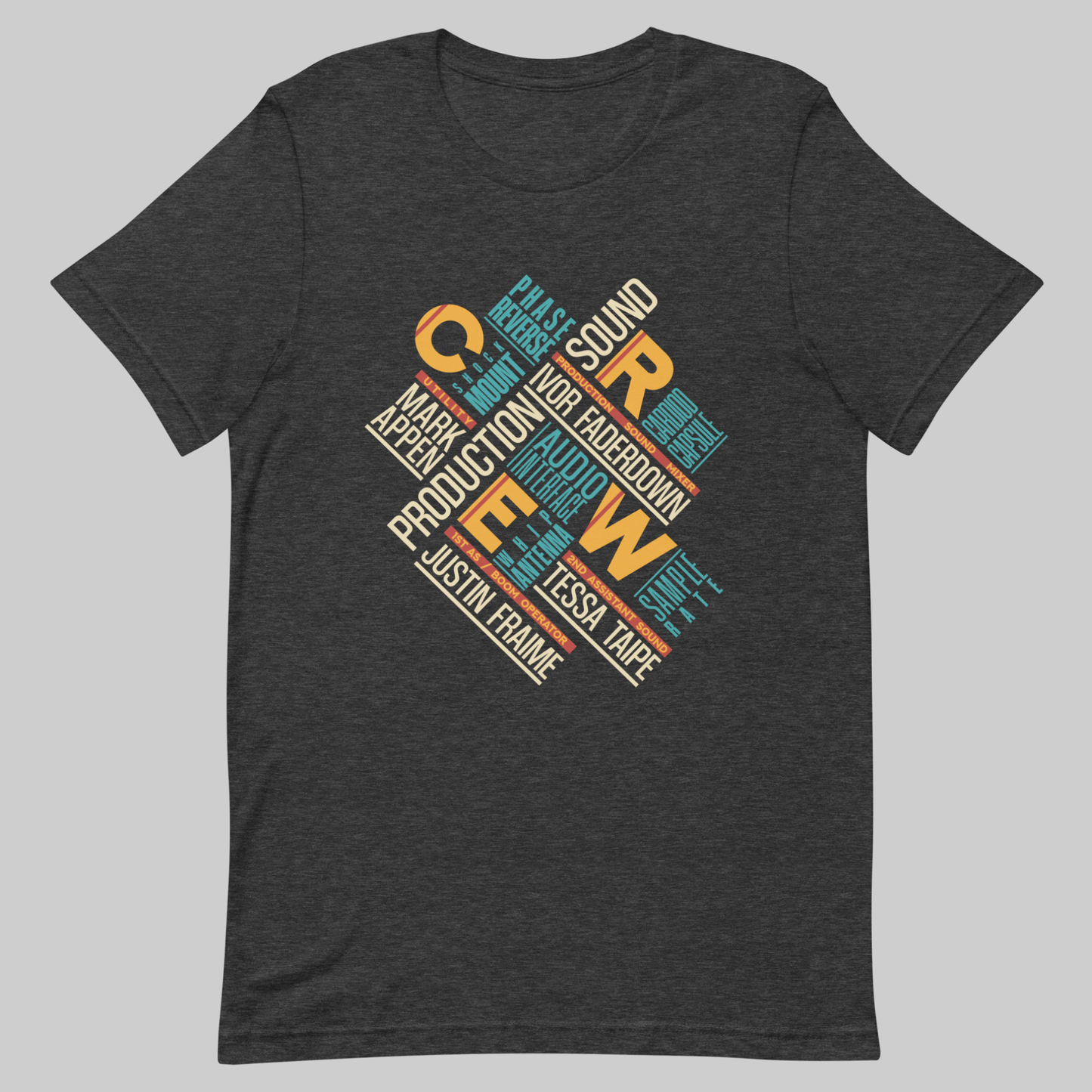 Credits Film Sound Crew graphic t-shirt. Front view of an open grey t-shirt with a colourful typographic design on it.