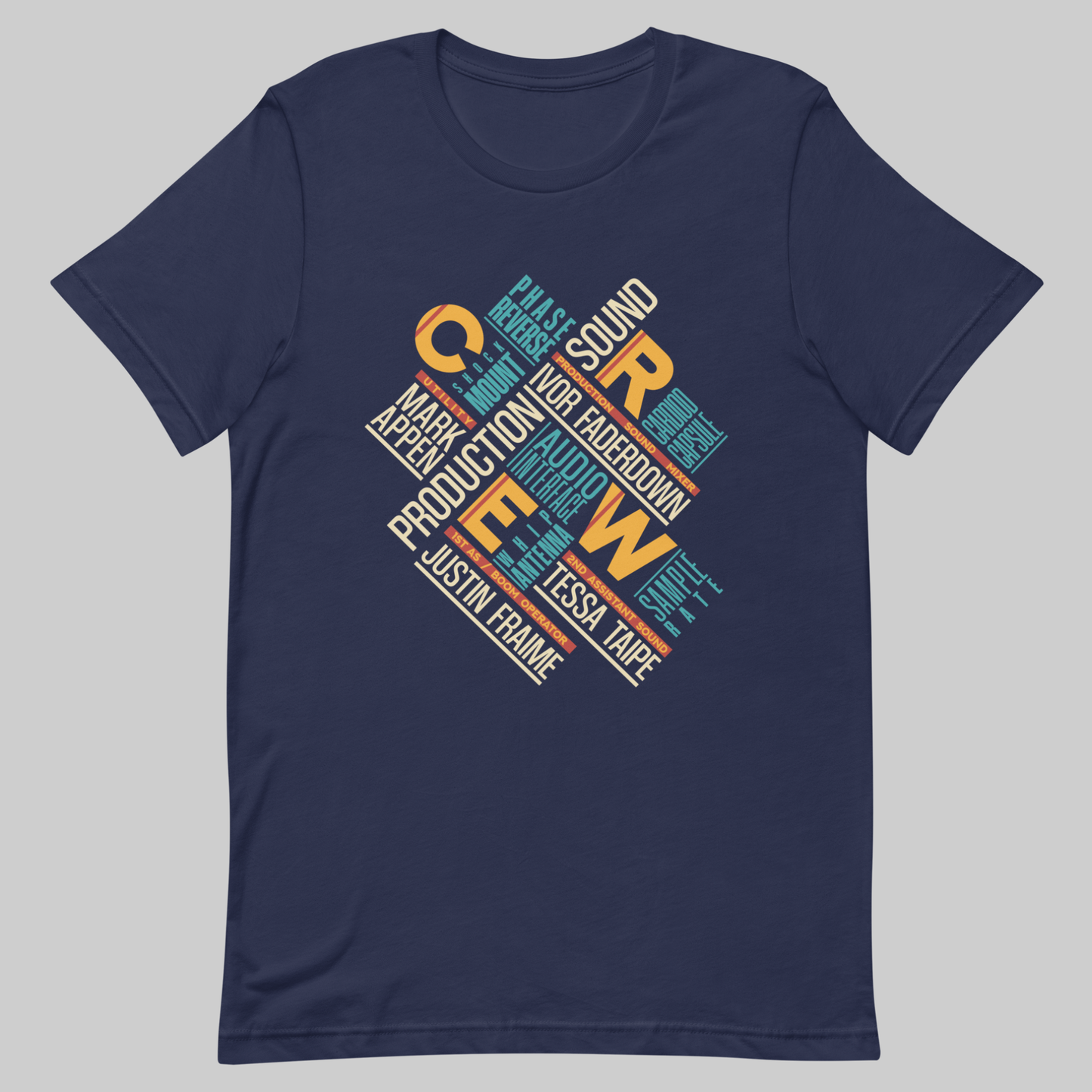 Credits Film Sound Crew graphic t-shirt. Front view of an open navy t-shirt with a colourful typographic design on it.