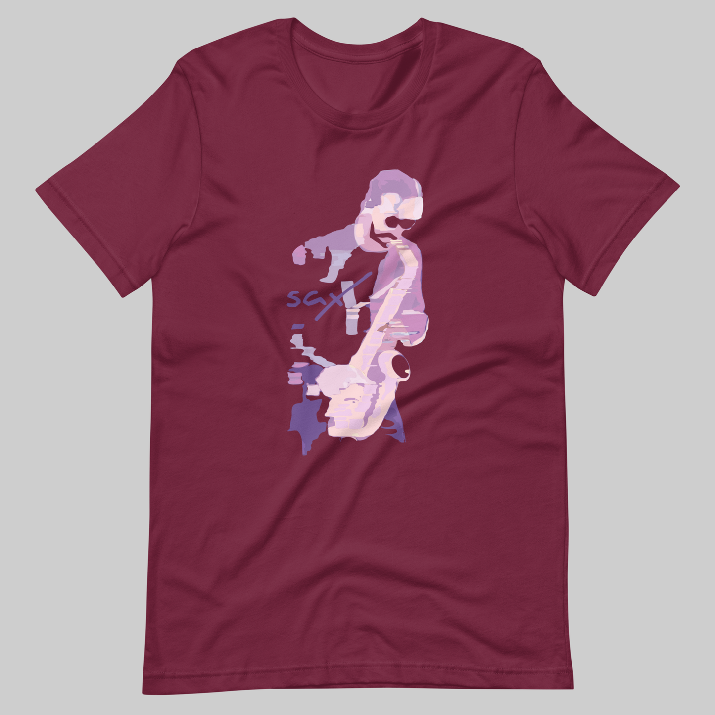 Saxy Man Lavender Notes graphic t-shirt. Front view of maroon t-shirt with a graphic design of a saxophone player.