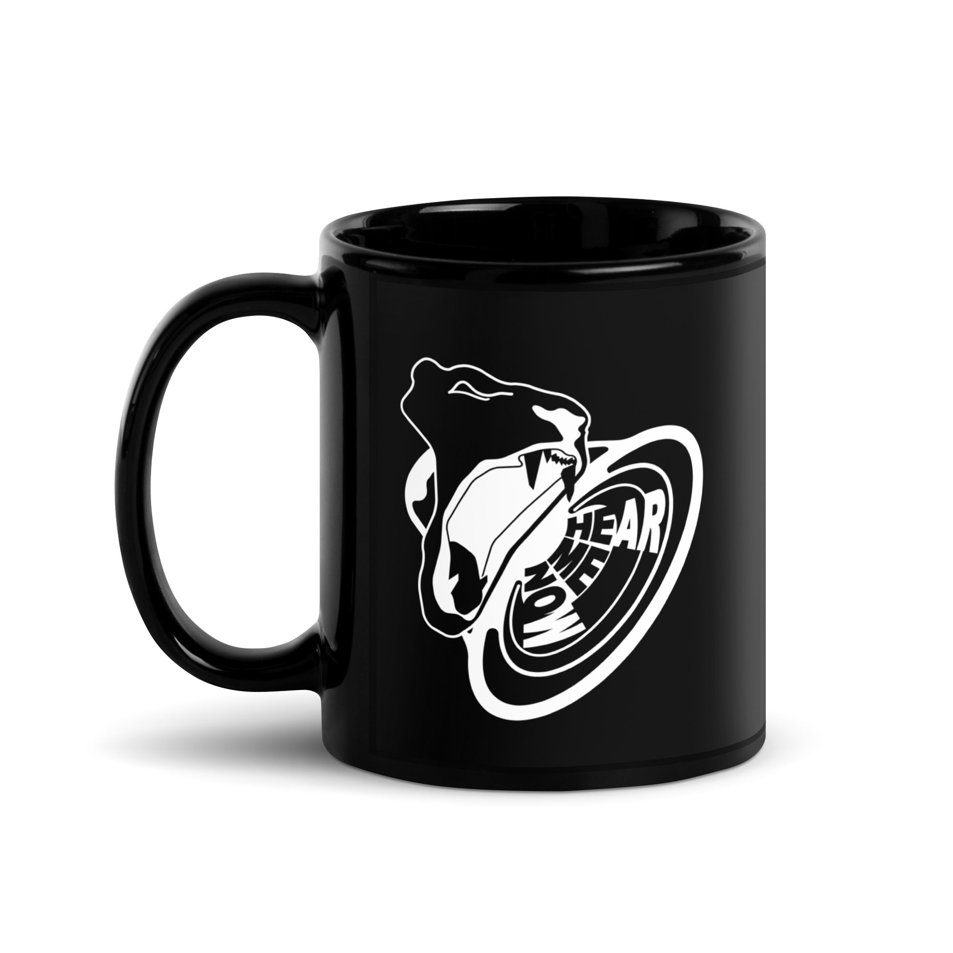 Hear Me Now King of Beasts glossy black mug. Side view of black mug with the handle to the left. On the mug is a graphic of a roaring lion with the words Hear Me Now.