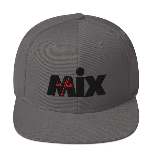 In The Mix embroidered snapback cap. Front view of grey cap with embroidered text that says MIX.