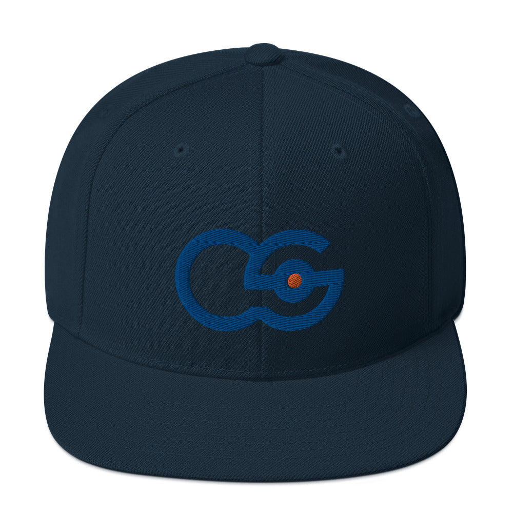 Crew Show logo snapback cap. Close up front view of dark navy snapback cap with embroidered Crew Show logo on it.