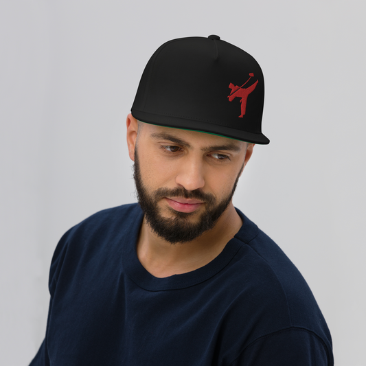 Art Form Red,  Boom operator, Snapback cap. Front view of man wearing black cap with a red embroidered graphic of martial arts fighter kicking up into the air, holding a microphone boom pole.