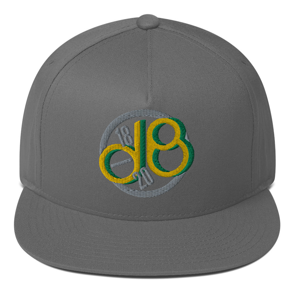 Line Up Tone classic snapback cap. Close up front view of grey cap with an embroidered graphic of the letters d & b.