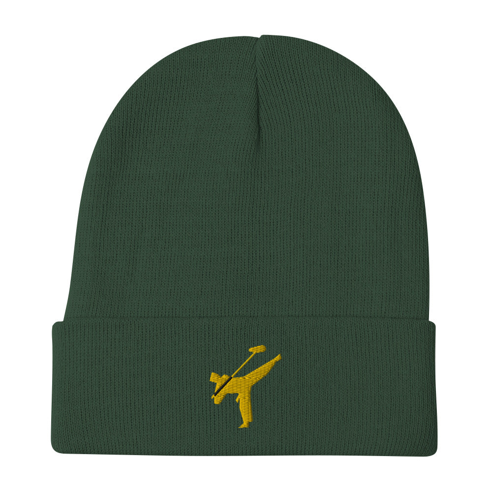 Art Form Gold boom op icon embroidered beanie. Front view of a green beanie with an embroidered graphic of a martial arts fighter.