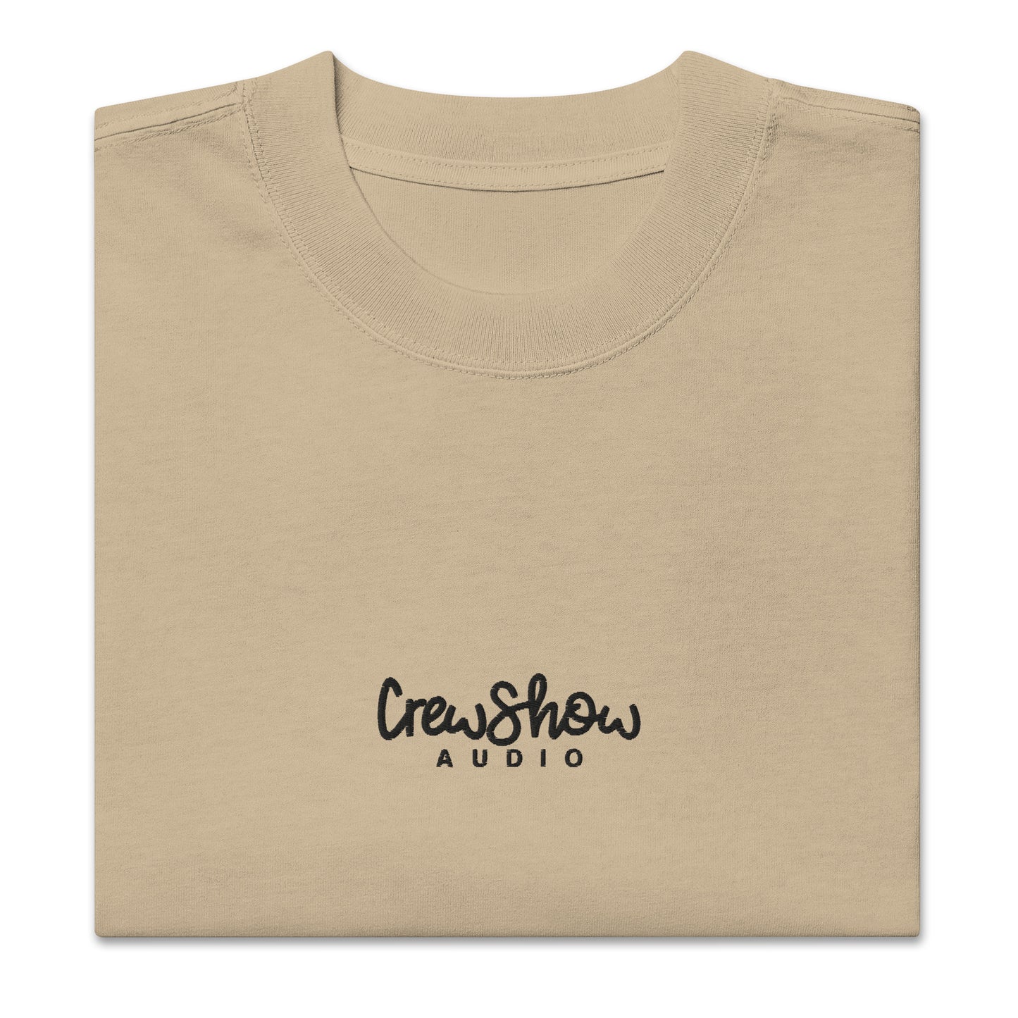 Crew Show Flow Script style embroidered t-shirt. Front view of folded  khaki coloured t-shirt which has Crew Show Audio embroidered on it.