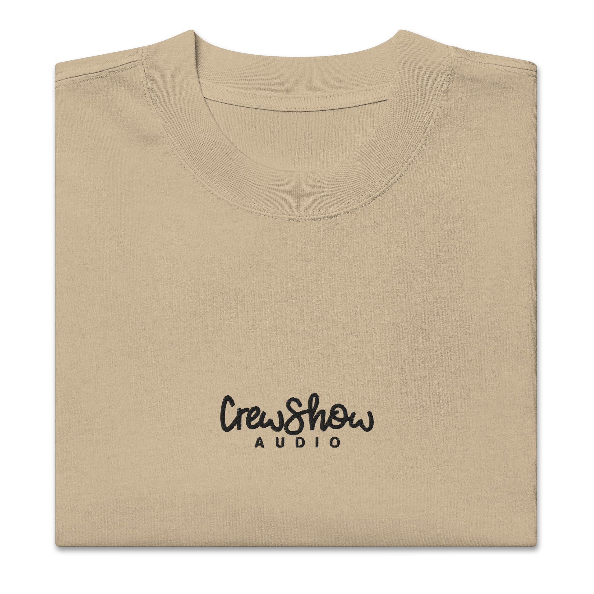 Crew Show Flow Script style embroidered t-shirt. Front view of folded  khaki coloured t-shirt which has Crew Show Audio embroidered on it.