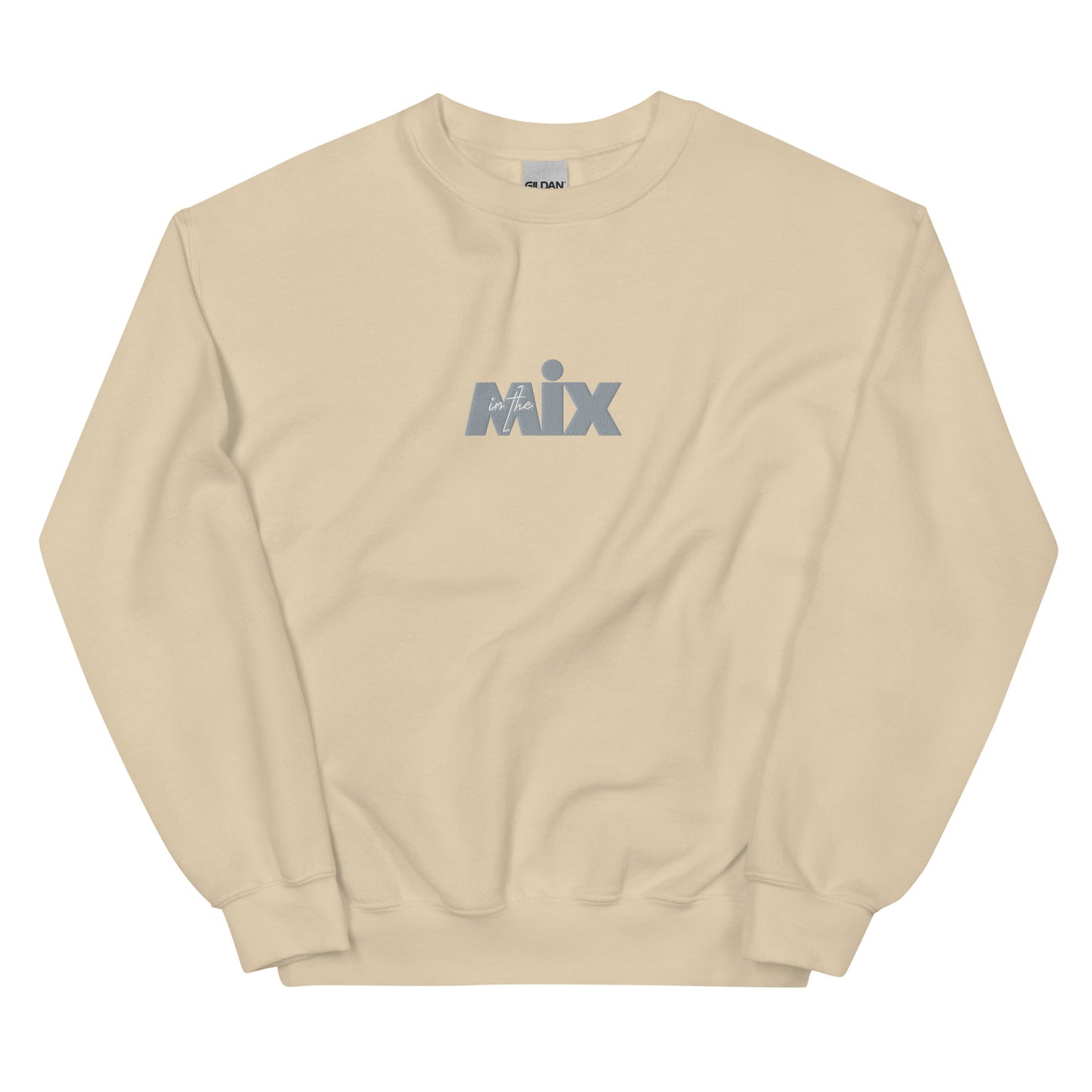 In The Mix embroidered sweatshirt. Front view of a sand colour sweatshirt with an embroidered text graphic that says MIX.