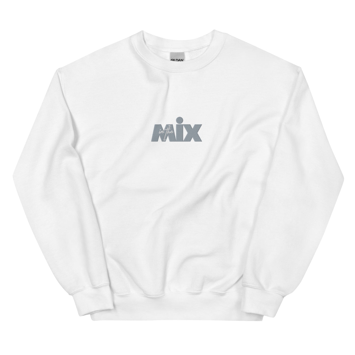 In The Mix embroidered sweatshirt. Front view of a white sweatshirt with an embroidered text graphic that says MIX.