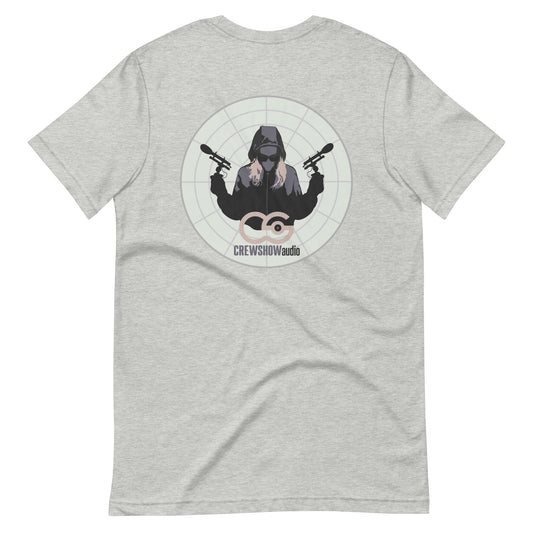 Assassin Sound Capture graphic t-shirt. Back view of athletic heather colour t-shirt with graphic of a woman holding 2 microphones.