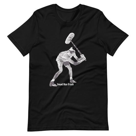 Sound Man Crash Boom operator graphic T-shirt. Front view of open black t-shirt with a graphic of a man smashing a boom microphone towards the ground. 