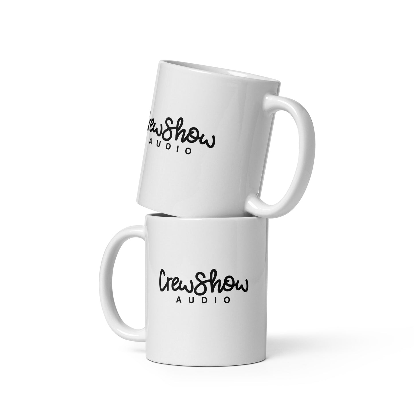 Crew Show Audio Script glossy white mug. Side view of 2 white mugs, one ontop of the other. The text graphic
on the mugs say CrewShow AUDIO.